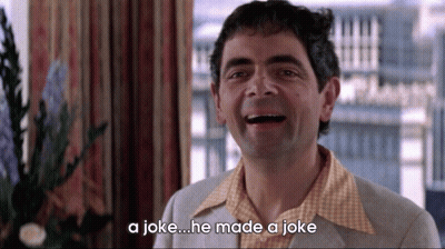 A Man Is Laughing With The Words A Joke He Made A Joke Below Him GIF