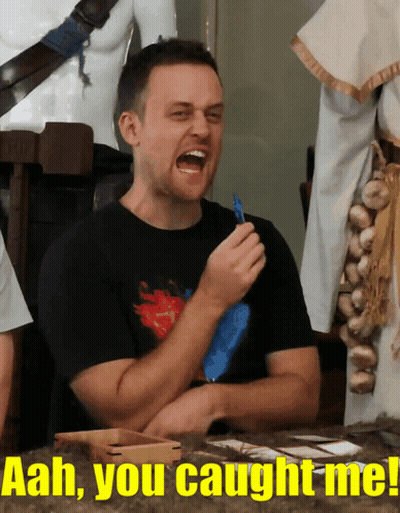 A Man Is Laughing With The Words " Aah You Caught Me " Behind Him GIF