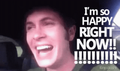 A Man Is Laughing With The Words " I 'M So Happy Right Now !!! " Behind Him GIF