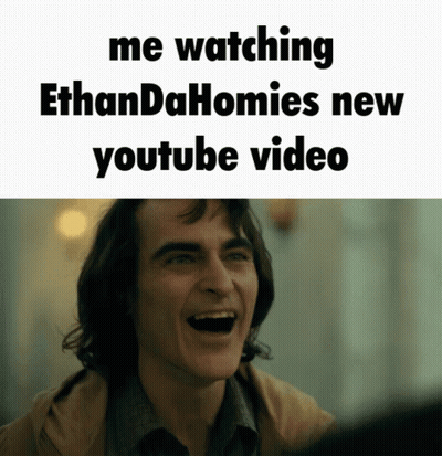 A Man Is Laughing With The Words Me Watching Ethandahomies New Youtube Video Below Him GIF
