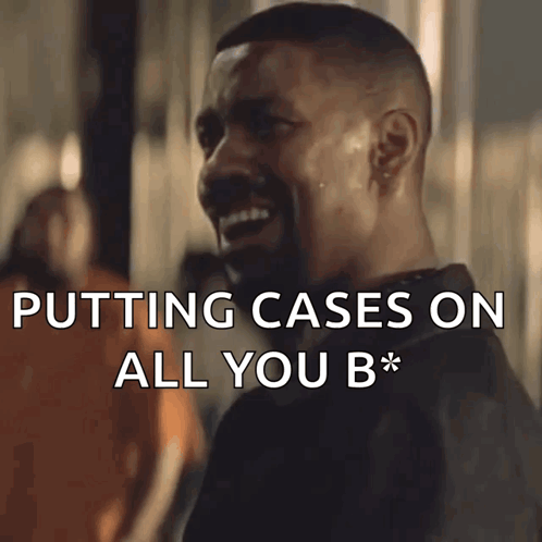 A Man Is Laughing With The Words Putting Cases On All You B* GIF
