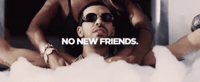 A Man Is Laying In A Bathtub Surrounded By Women With The Words No New Friends Below Him GIF