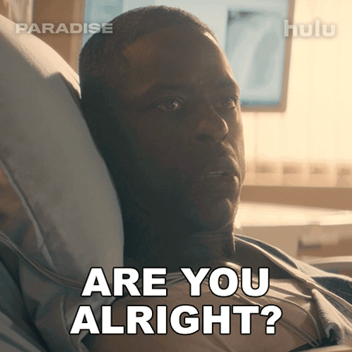 A Man Is Laying In A Hospital Bed And Says Are You Alright GIF