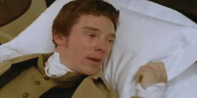A Man Is Laying In A Hospital Bed With A Bandage On His Neck And A White Pillow . GIF