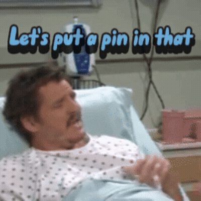 A Man Is Laying In A Hospital Bed With The Words Let 'S Put A Pin In That Above Him GIF