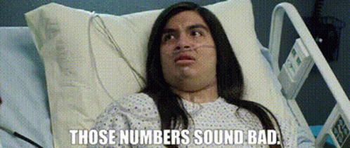 A Man Is Laying In A Hospital Bed With The Words Those Numbers Sound Bad On The Bottom GIF