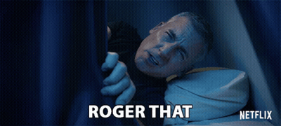 A Man Is Laying In Bed With The Words Roger That Written On The Bottom GIF