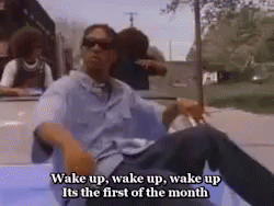 A Man Is Laying In The Back Of A Car With The Words Wake Up Wake Up Wake Up Its The First Of The Month GIF