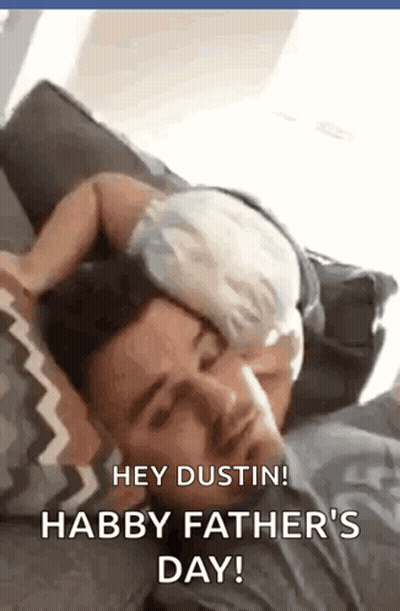 A Man Is Laying On A Couch With A Baby On His Head And Says " Hey Dustin ! Happy Father 'S Day " GIF