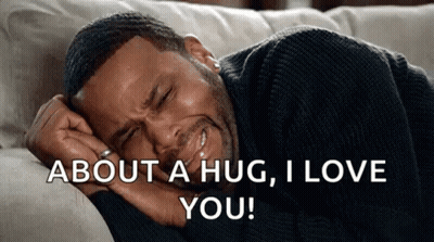 A Man Is Laying On A Couch With His Head On His Hand And Says `` About A Hug , I Love You '' . GIF
