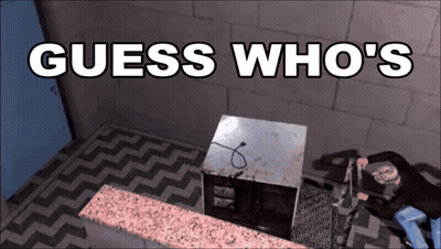 A Man Is Laying On The Floor With The Words Guess Who 'S Written Above Him GIF