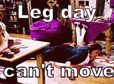 A Man Is Laying On The Floor With The Words Leg Day Can 'T Move Behind Him GIF