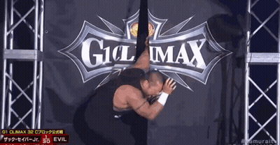 A Man Is Laying On The Ground In Front Of A Sign That Says Climax GIF