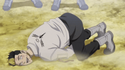 A Man Is Laying On The Ground With His Eyes Closed And A White Shirt With The Letter A On It GIF