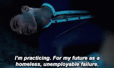 A Man Is Laying On The Ground With The Words I 'M Practicing For My Future As A Homeless , Unemployed Failure GIF