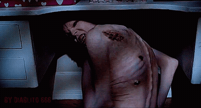 A Man Is Laying Under A Desk With The Words By Diablito 666 Written On The Bottom GIF