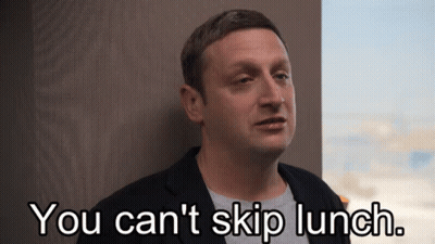 A Man Is Leaning Against A Wall And Saying You Can 'T Skip Lunch . GIF