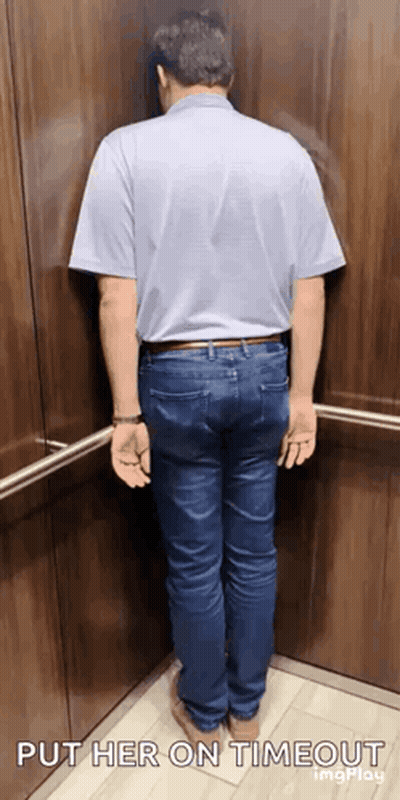 A Man Is Leaning Against A Wall In An Elevator And The Caption Says Put Her On Timeout GIF