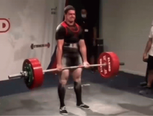 A Man Is Lifting A Barbell With A Red Barbell With The Letter D On It GIF