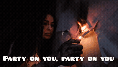 A Man Is Lighting A Cigarette Next To A Woman With The Words Party On You GIF