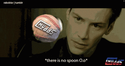 A Man Is Looking At A Baseball That Says Huds On It GIF