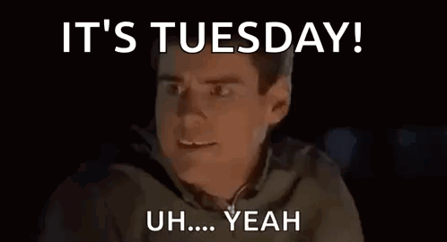 A Man Is Looking At A Computer Screen With The Words `` It 'S Tuesday ! Uh ... Yeah '' On It . GIF