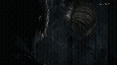 A Man Is Looking At Himself In A Mirror . GIF