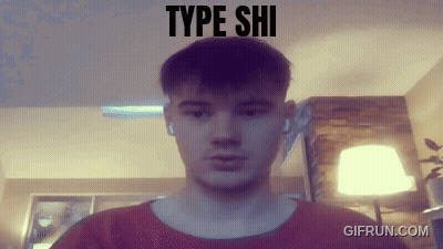 A Man Is Looking At The Camera With The Words Type Shi Above His Head GIF