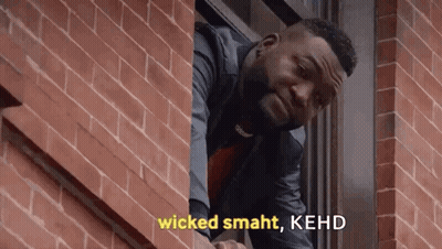 A Man Is Looking Out Of A Window And Says `` Wicked Smaht , Kehd '' GIF