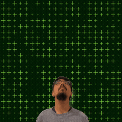 A Man Is Looking Up At The Number 29 With Stars Coming Out Of It GIF