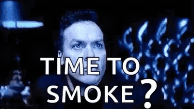 A Man Is Looking Up At The Sky With The Words `` Time To Smoke '' Written On The Screen . GIF