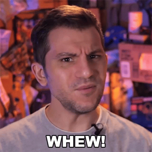 A Man Is Making A Face And Says Whew In Black Letters GIF
