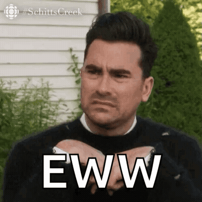 A Man Is Making A Funny Face And Holding His Hands Together With The Word Eww Written On His Chest . GIF