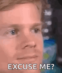 A Man Is Making A Funny Face And Saying `` Excuse Me ? '' GIF