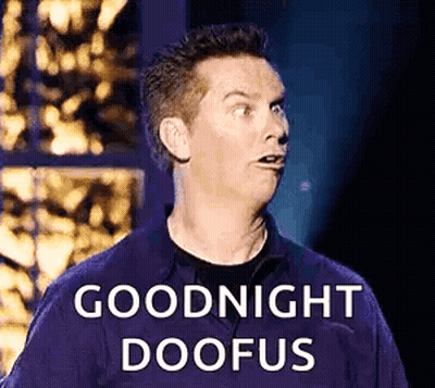 A Man Is Making A Funny Face And Saying `` Goodnight Doofus '' While Standing On A Stage . GIF