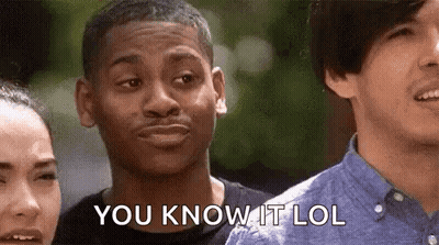 A Man Is Making A Funny Face And Saying `` You Know It Lol '' While Standing Next To Two Other Men . GIF