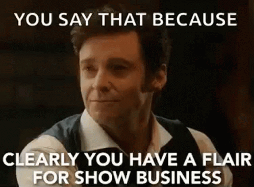A Man Is Making A Funny Face And Saying `` You Say That Because Clearly You Have A Flair For Show Business '' GIF