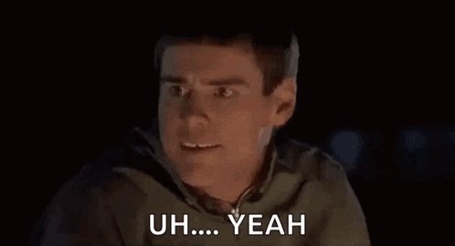 A Man Is Making A Funny Face In The Dark And Saying `` Uh ... Yeah '' . GIF