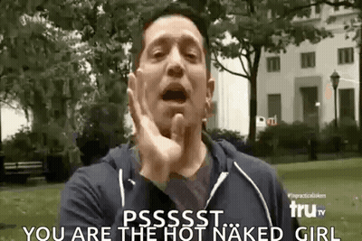 A Man Is Making A Funny Face While Standing In A Park And Says `` You Are The Hot Naked Girl '' . GIF