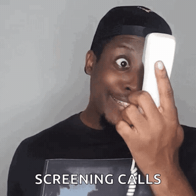 A Man Is Making A Funny Face While Talking On A Telephone With The Words Screening Calls Written Below Him GIF