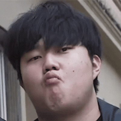 A Man Is Making A Funny Face With His Mouth Open . GIF