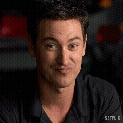 A Man Is Making A Funny Face With The Word Nope In Front Of Him GIF