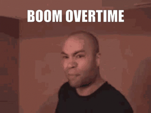 A Man Is Making A Funny Face With The Words Boom Overtime Behind Him GIF