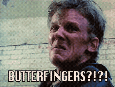 A Man Is Making A Funny Face With The Words Butterfingers Written Above Him GIF