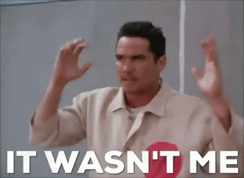 A Man Is Making A Funny Face With The Words It Wasn 'T Me Behind Him GIF