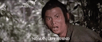 A Man Is Making A Funny Face With The Words No Man Left Behind Above Him GIF