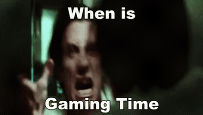 A Man Is Making A Funny Face With The Words `` When Is Gaming Time '' Written Above Him . GIF