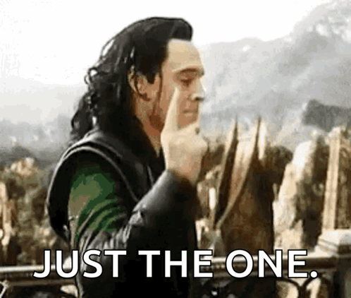 A Man Is Making A Gesture With His Finger And The Words Just The One . GIF