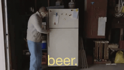 A Man Is Opening A Refrigerator That Says Beer On The Door GIF