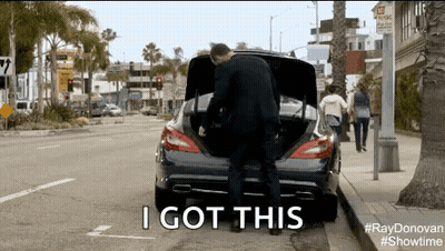 A Man Is Opening The Trunk Of A Car And Says I Got This . GIF